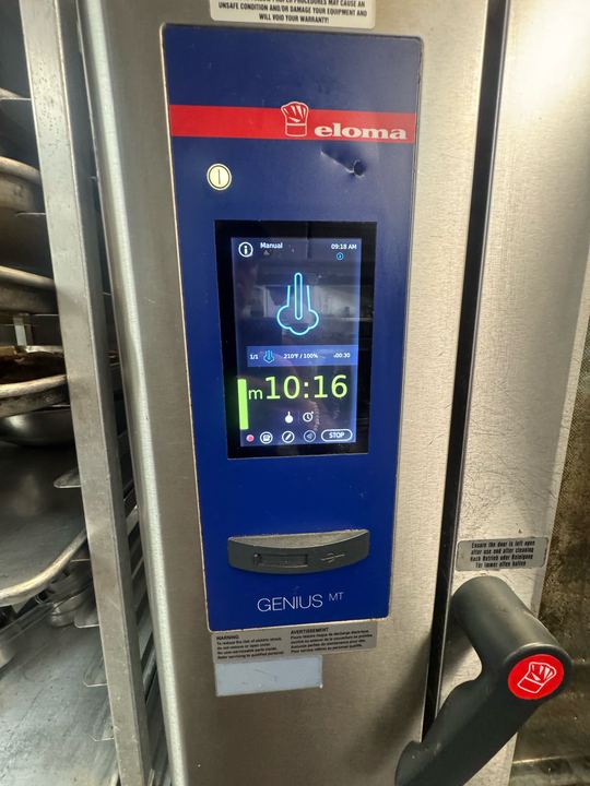 Eloma Genius MT combi oven touchscreen control panel showing a manual cooking program